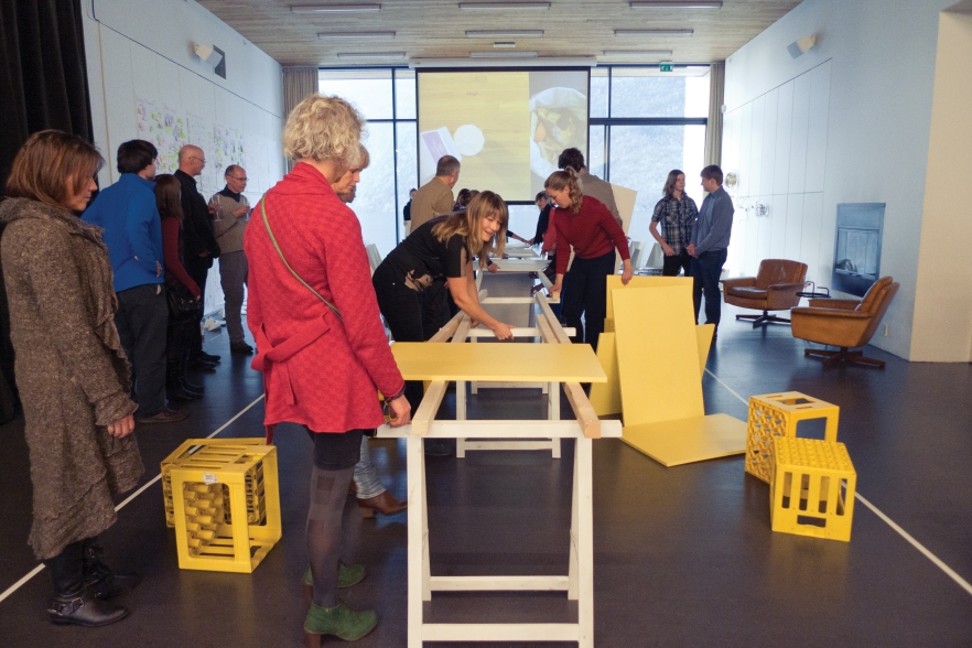 Preformance-dinner-guests-building-dining-table